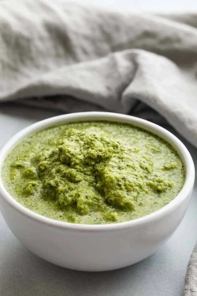 Peruvian Green Sauce in a white bowl