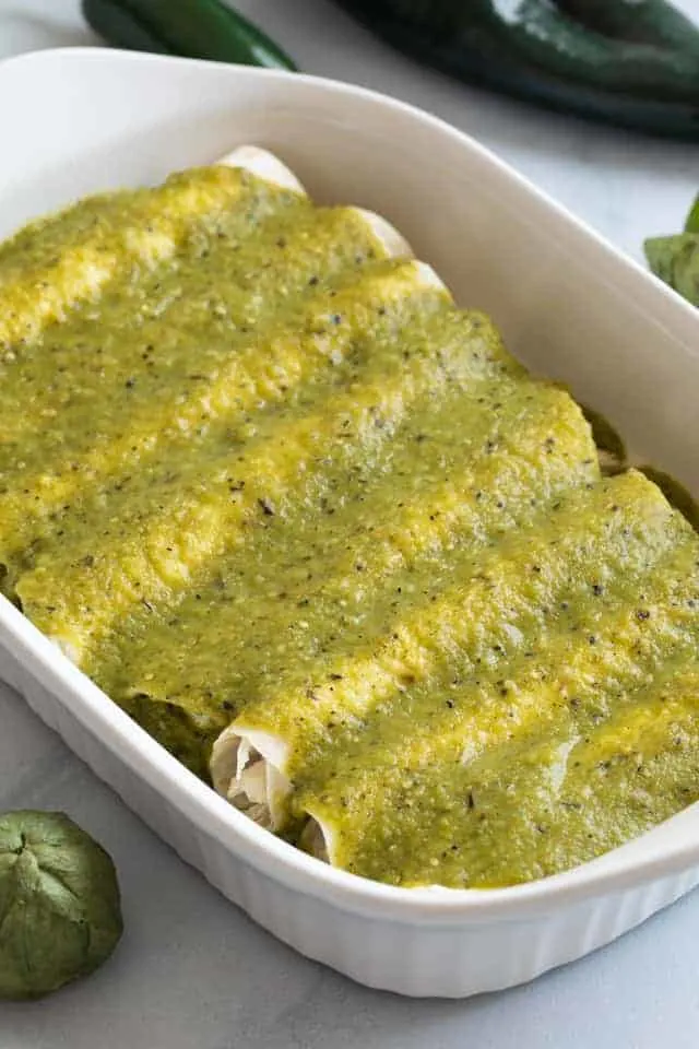 Green Enchilada Sauce over chicken enchiladas