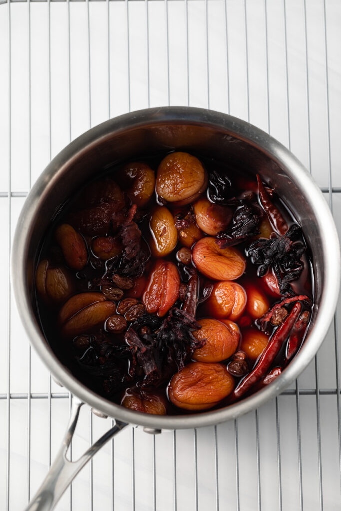 Ingredients for chamoy sauce cooked in sauce pan.