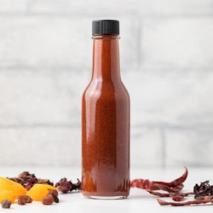 Bottled chamoy sauce.