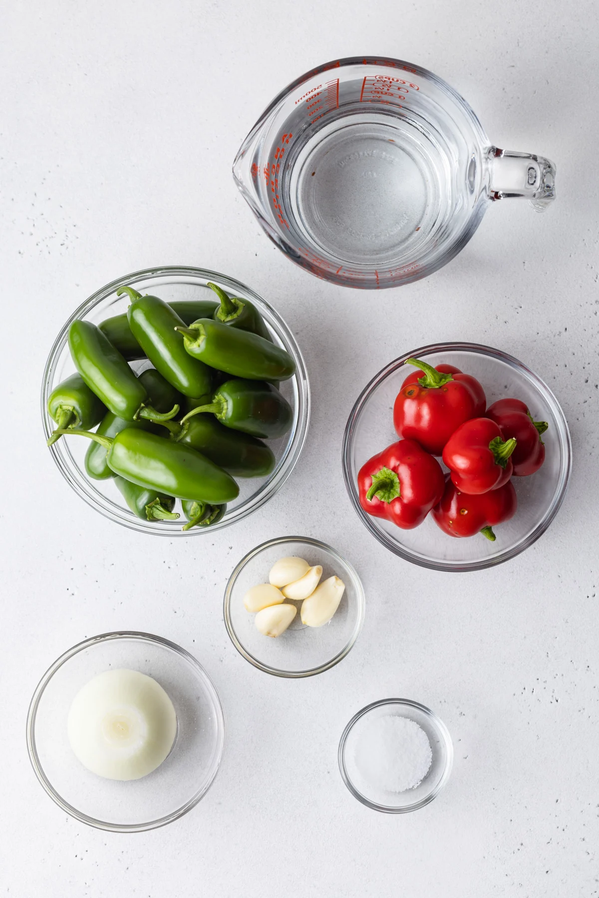 Overhead of ingredients to make jalapeno hot sauce.