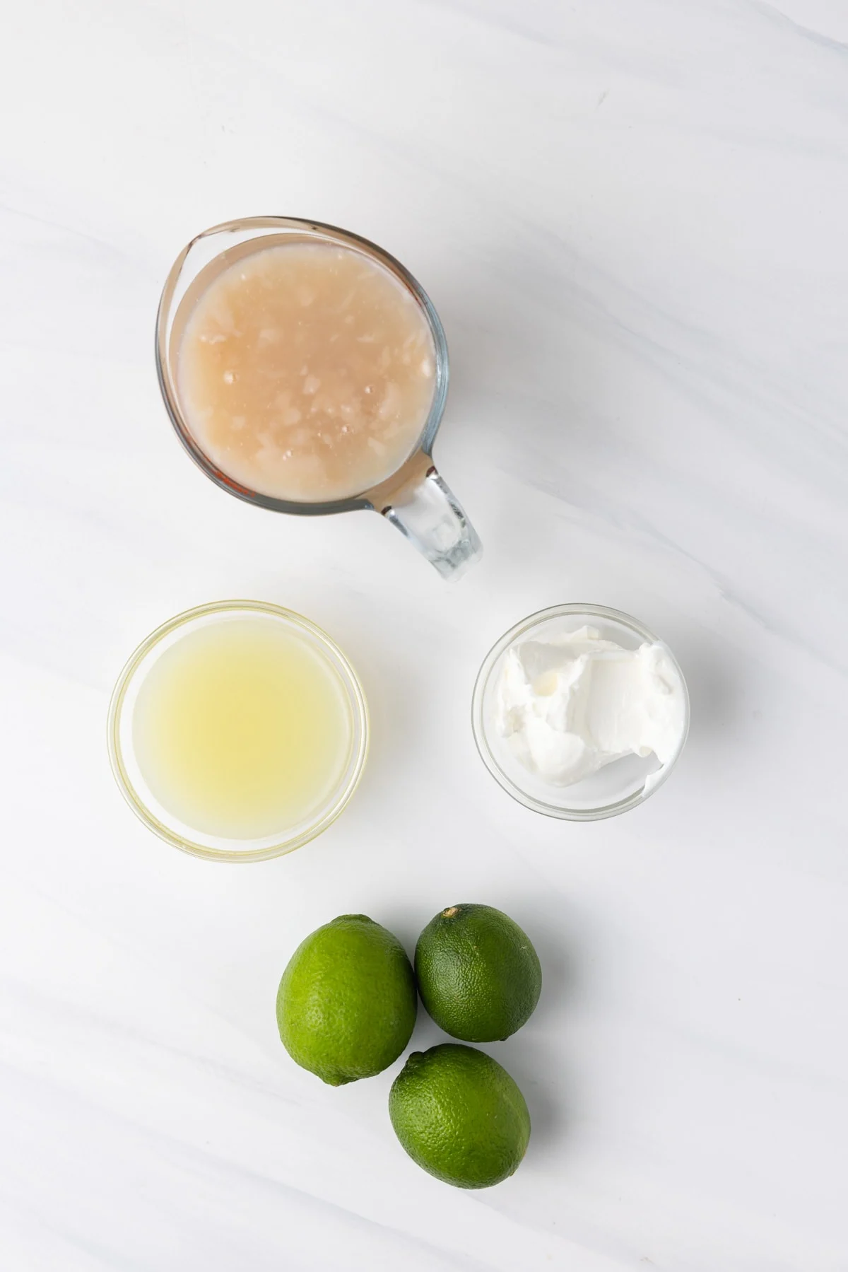 Coconut cream, lime juice, sour cream, and limes.