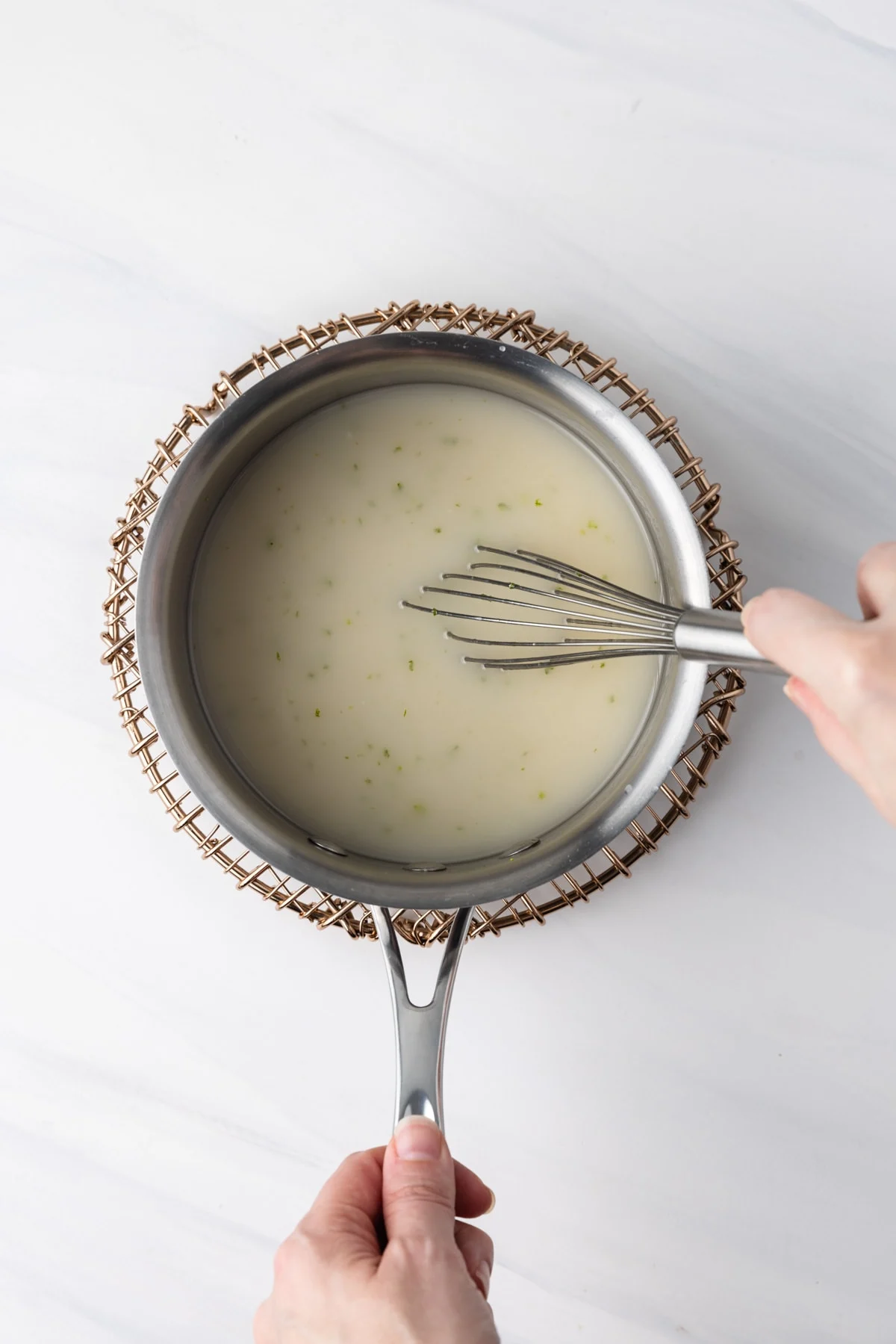 Coconut cream sauce in a pot.