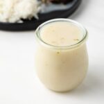 Jar of coconut cream sauce.