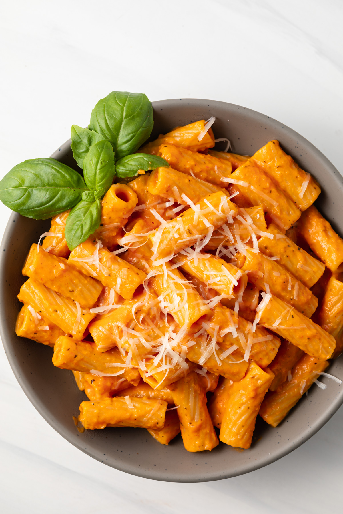 Overhead of pasta in vodka sauce.