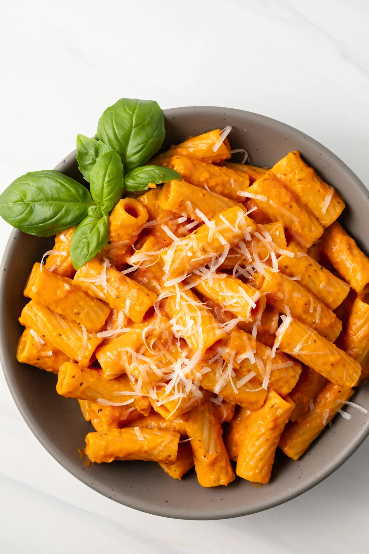 Overhead of pasta in vodka sauce.