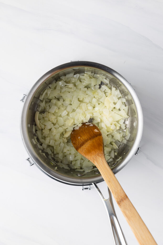 Sauteed onions in pot.