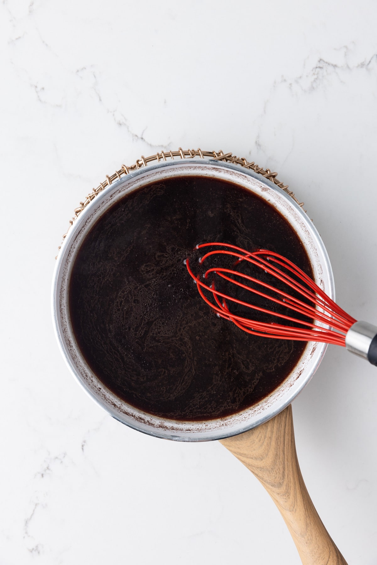 Au Jus Recipe - Sauce Fanatic 4 Homemade Au Jus Sauce in a pan.