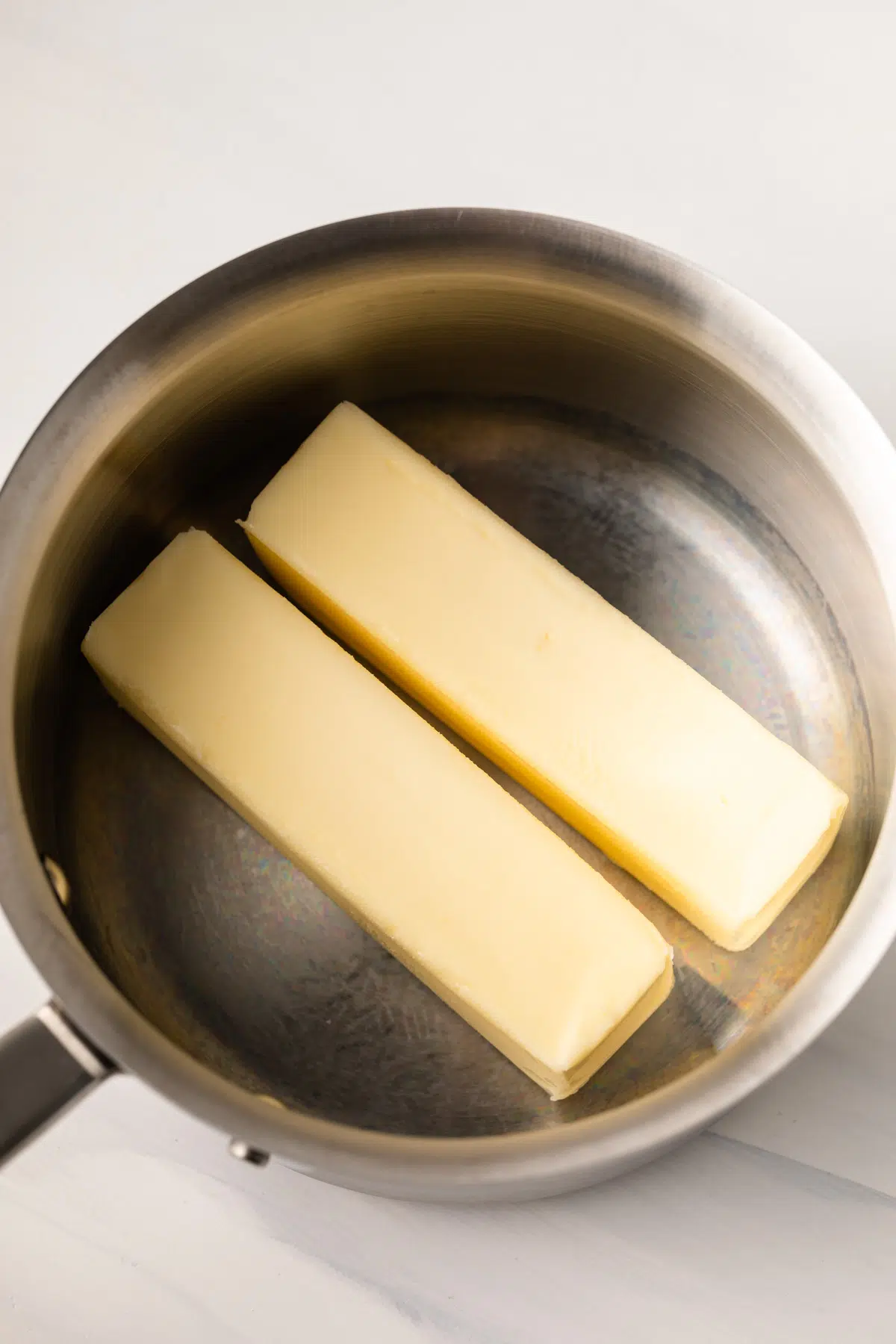 Butter in a saucepan.