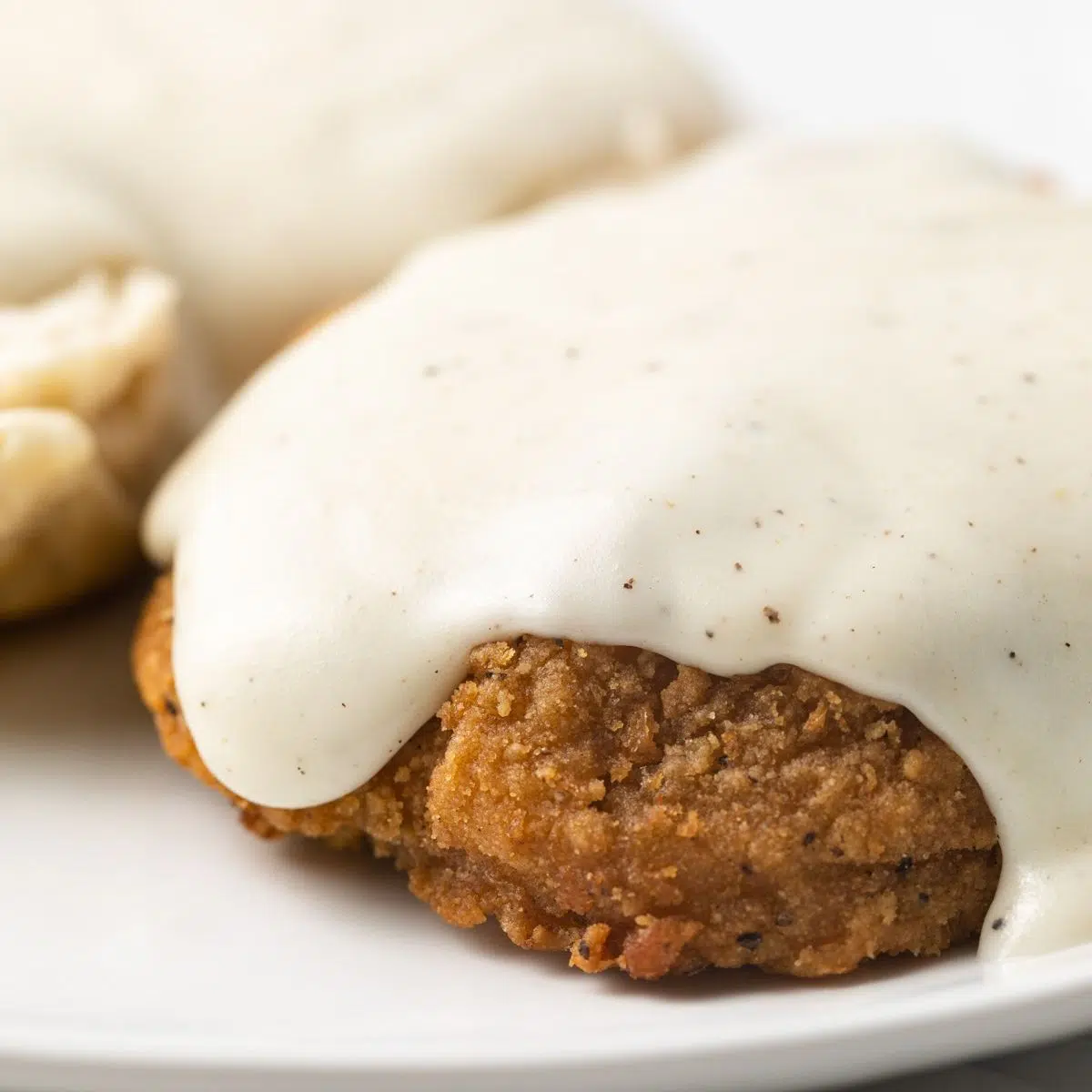 Country white gravy over fried steak.