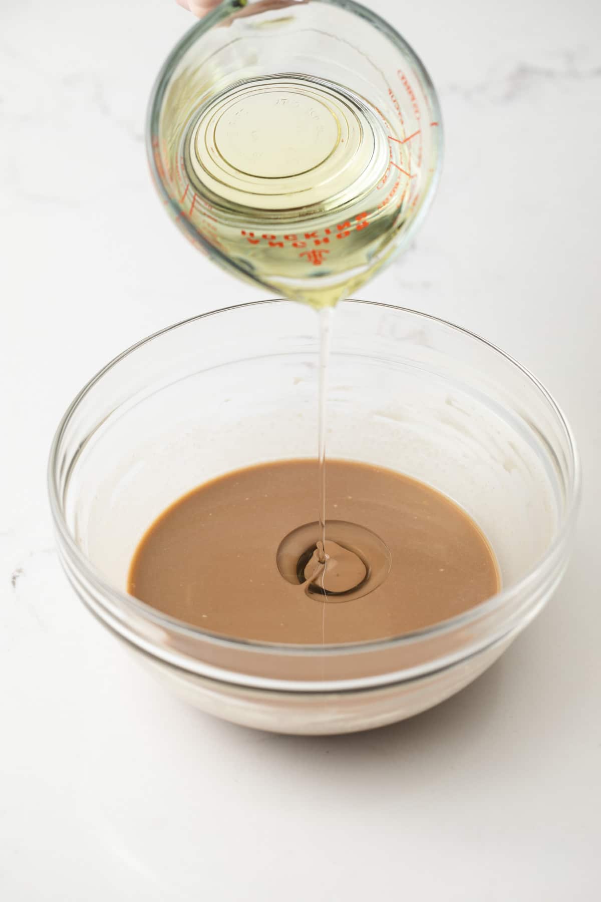 Adding oil to balsamic dressing