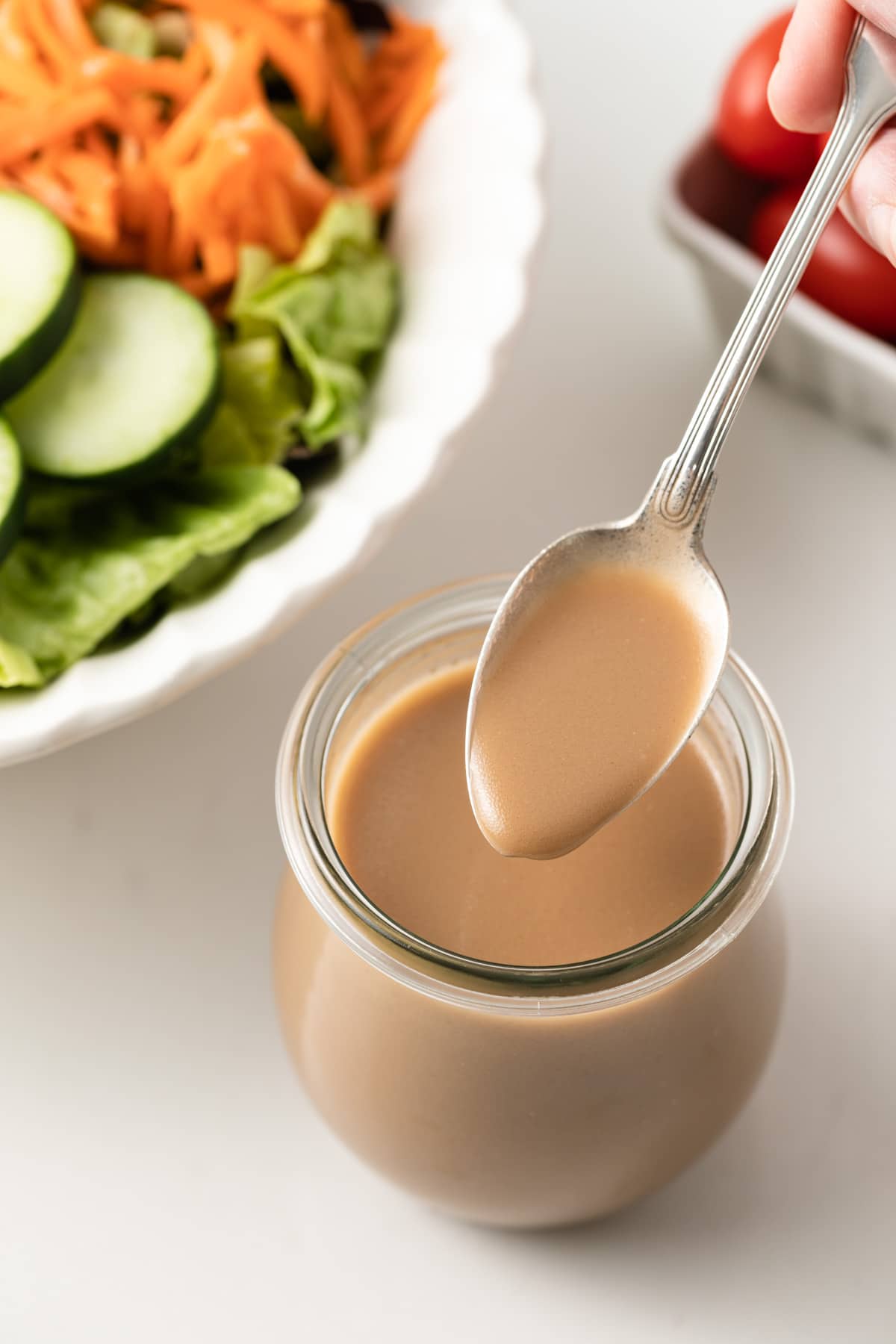 Balsamic dressing on a spoon.