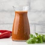 Peri peri sauce in a glass jar.