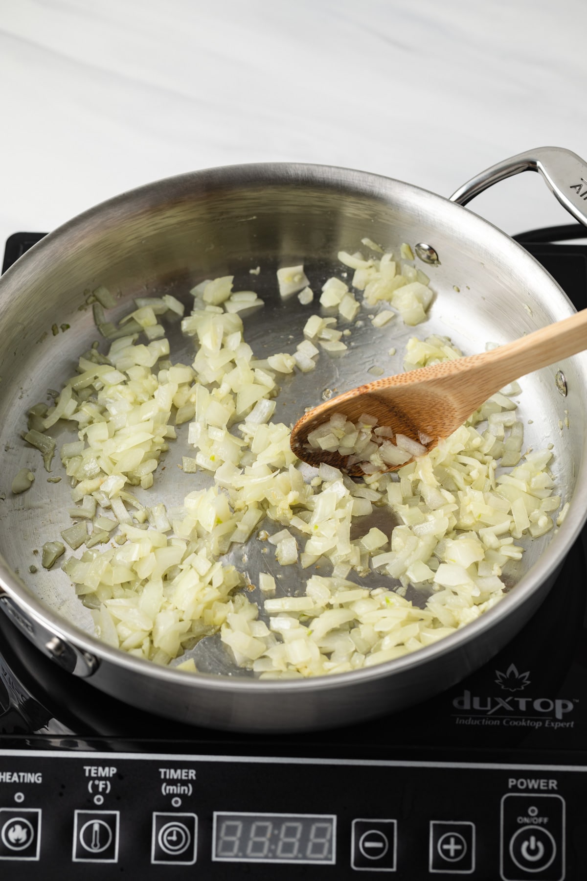 Onion cooked in sauce pan.