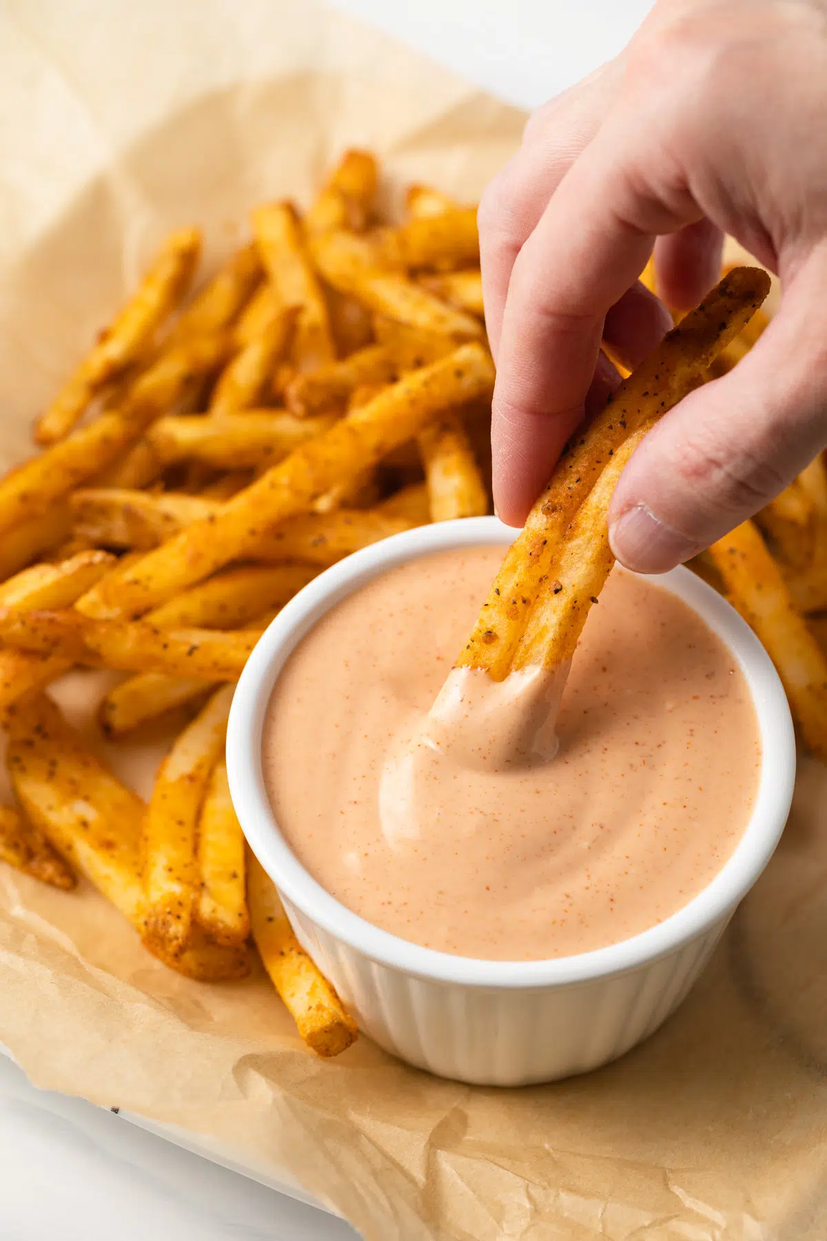 French fries dipped in French fry sauce.