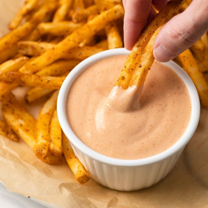 French fries dipped in French fry sauce.
