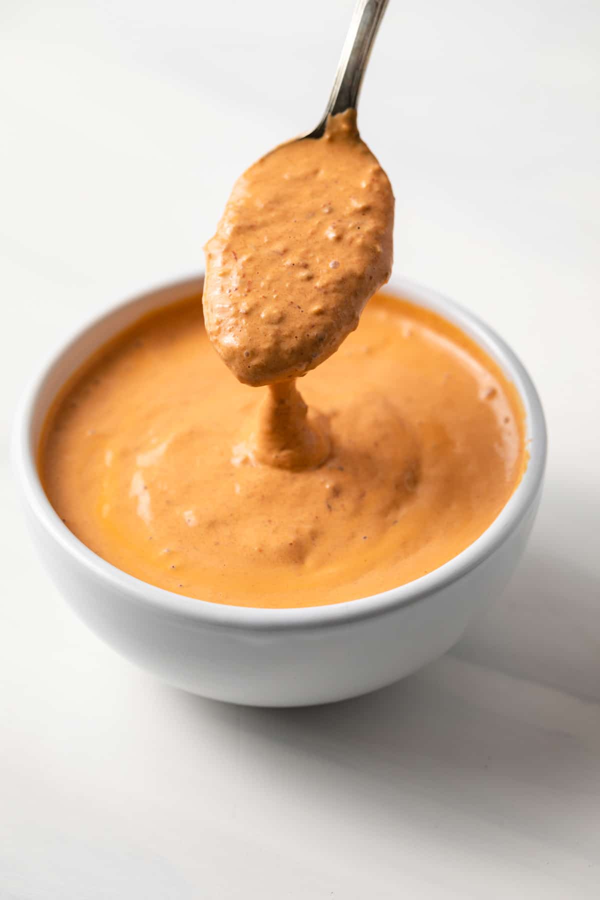 Chipotle sauce on a spoon.