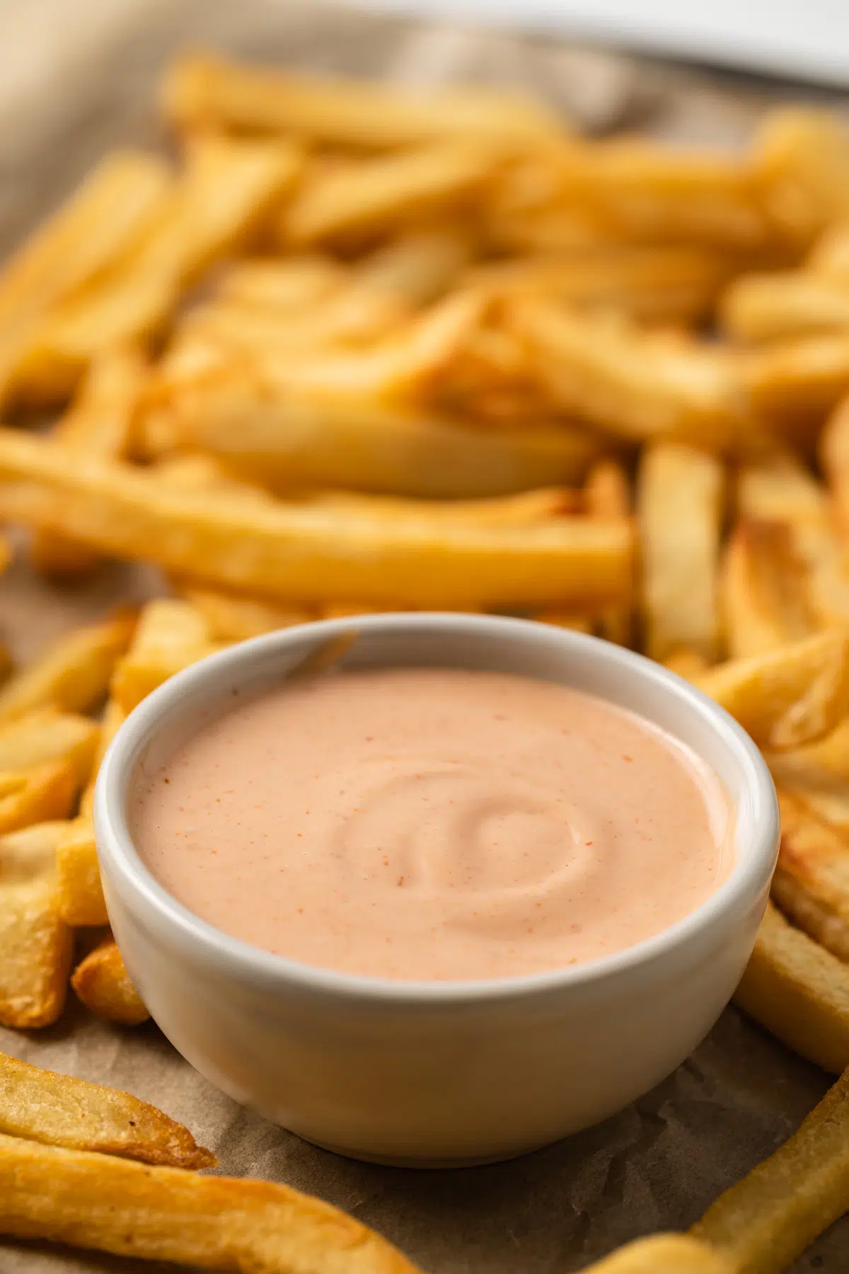 Side view of comeback sauce in a bowl.