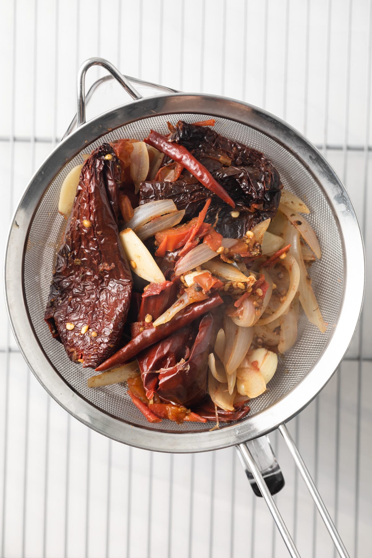 Strained ingredients for consome sauce.