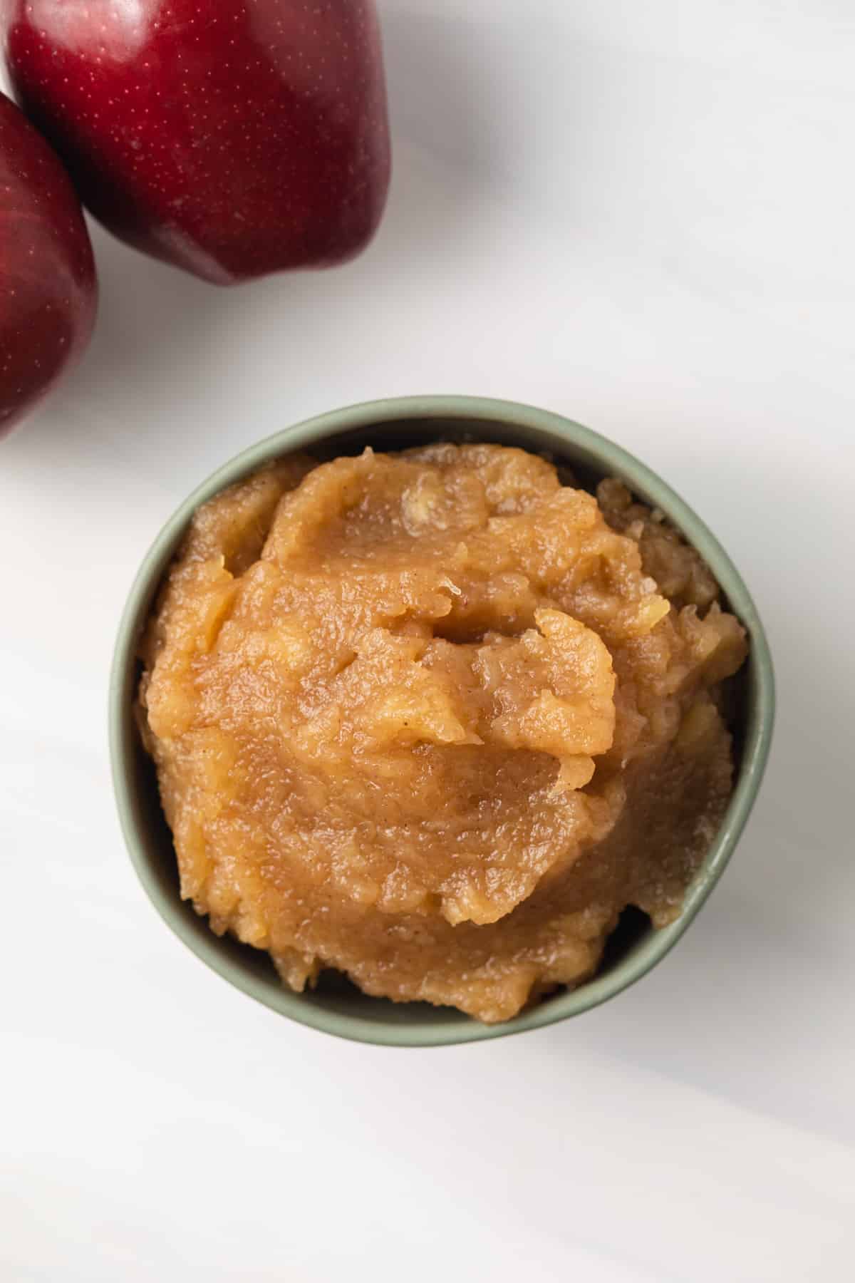 Overhead easy applesauce in green bowl.