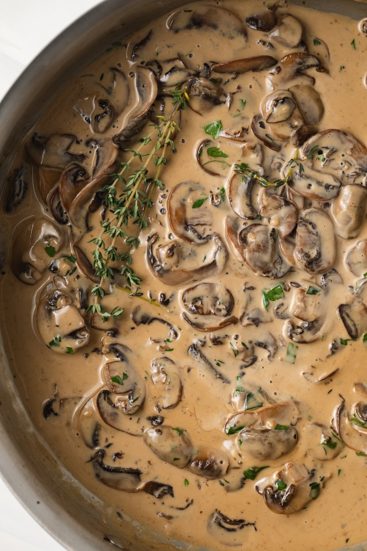 Close up of mushroom sauce in a fry pan.