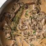 Close up of mushroom sauce in a fry pan.