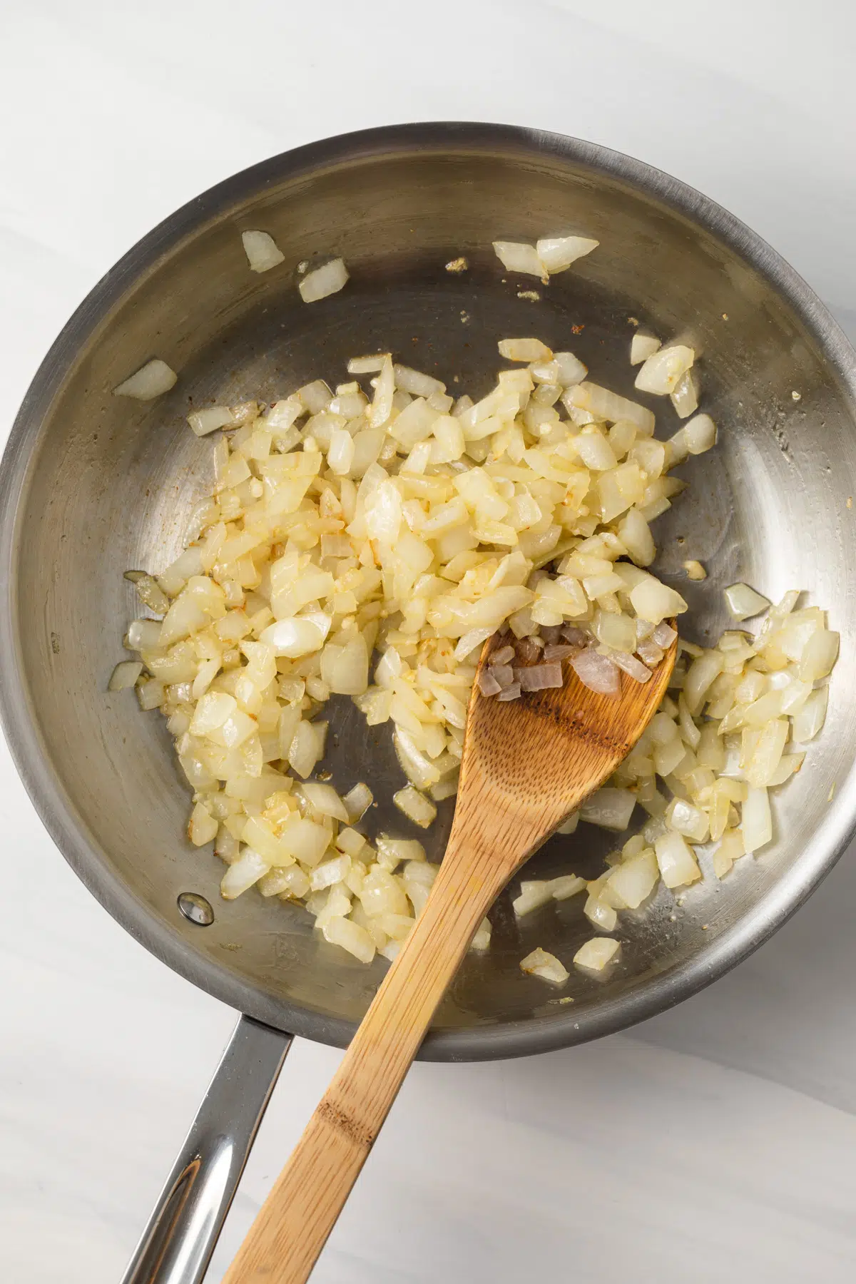 Sauteed onions and garlic in a fry pan.