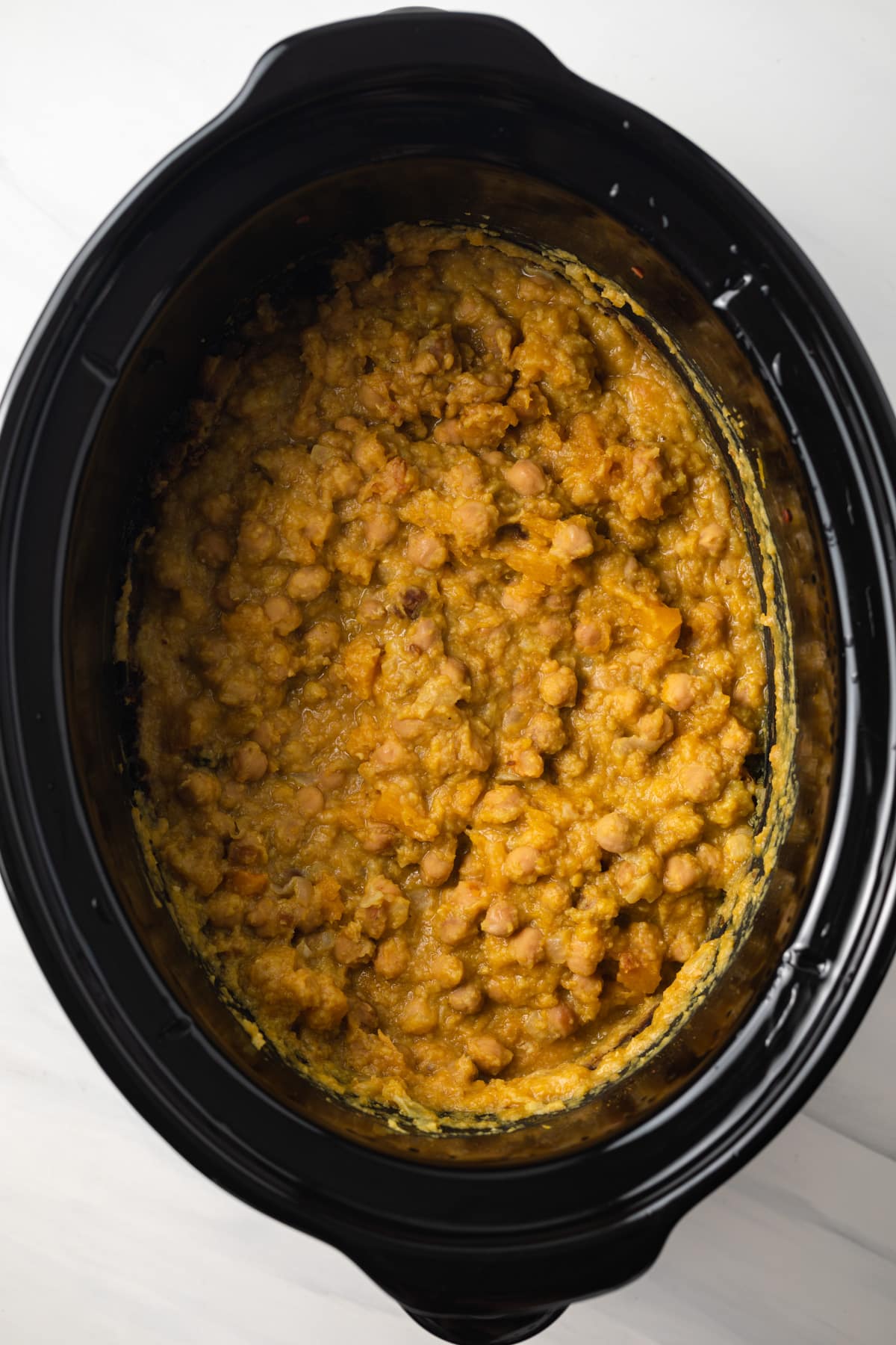 Vegan pumpkin curry in a slow cooker.