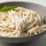 Pasta coated in garlic cream sauce.