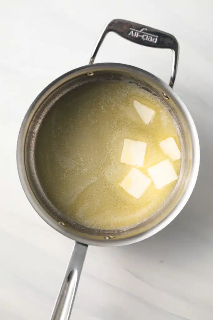 Melted butter in saucepan.