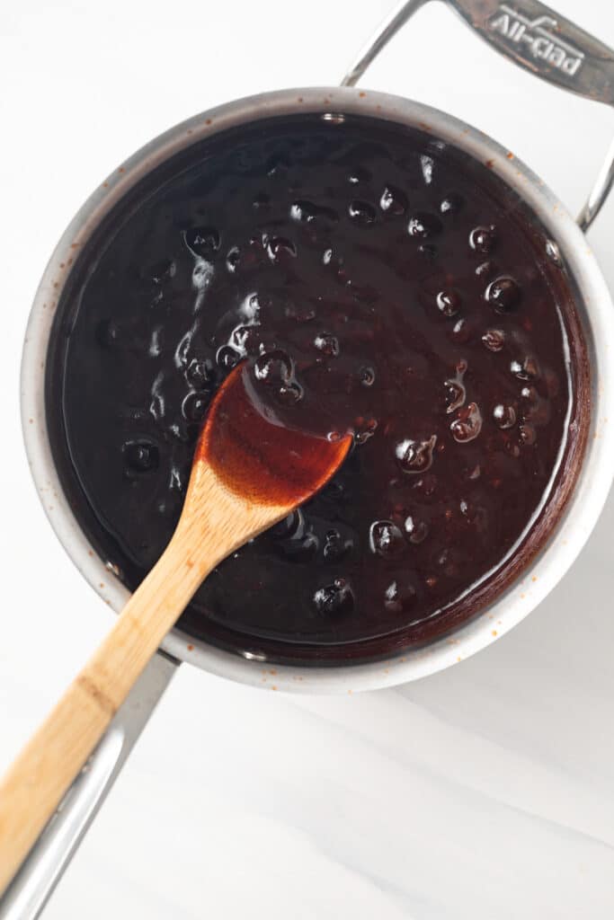 Blueberry BBQ suace in a saucepan.