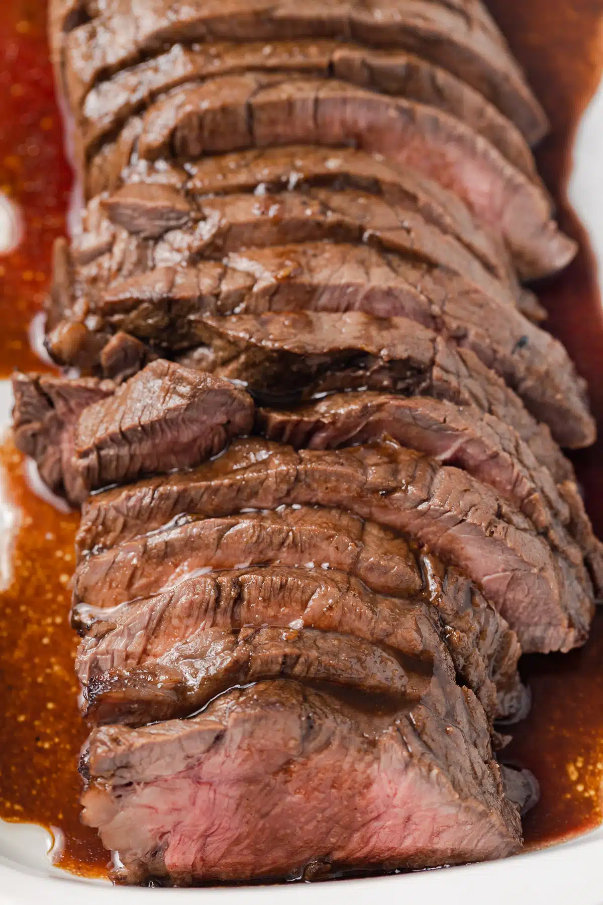 Close up of London Broil with marinade.