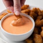 Fried shrimp dipped in bang bang sauce.