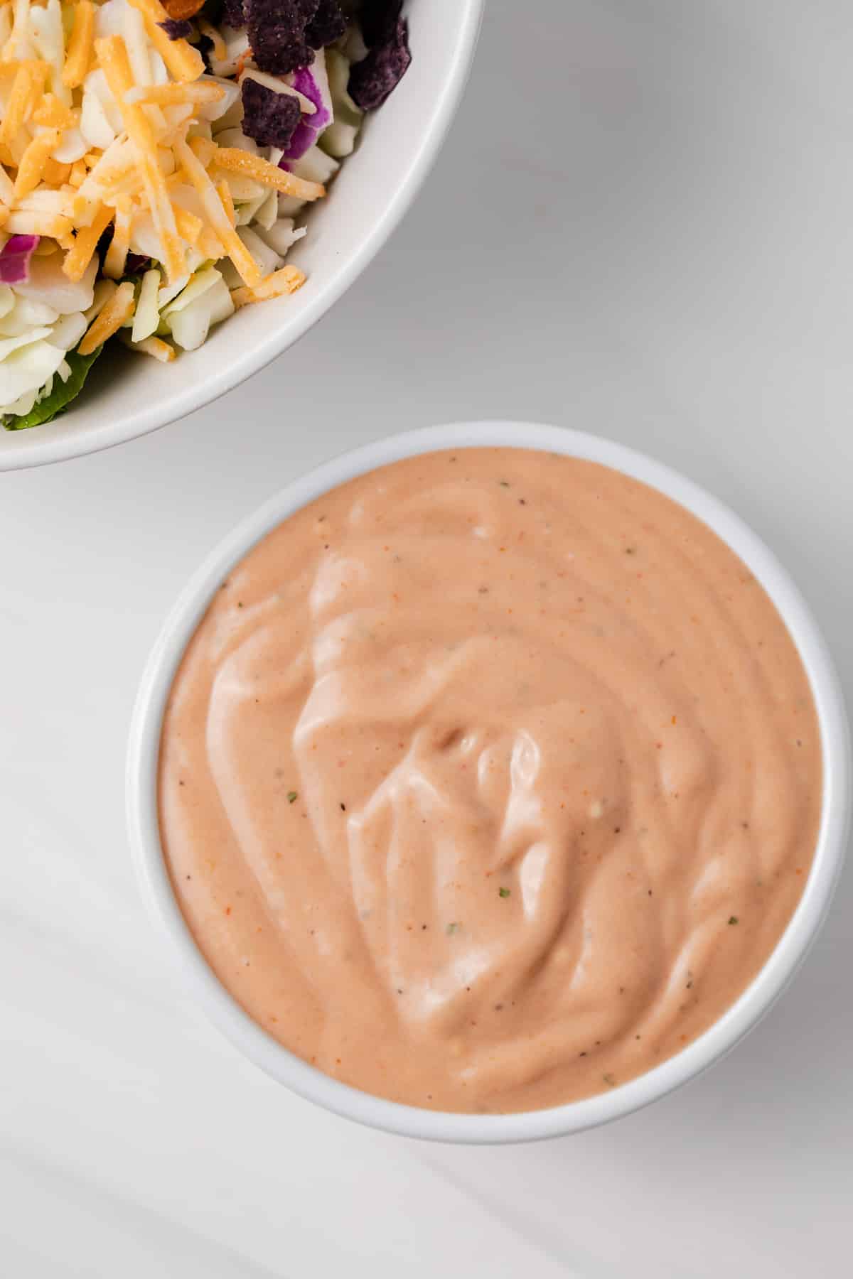 BBQ ranch dressing in white bowl.