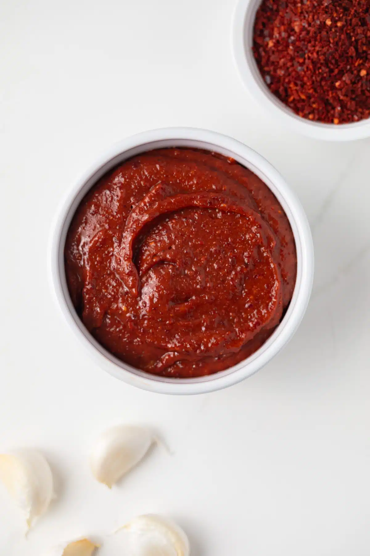 Overhead of easy gochujang in white bowl.