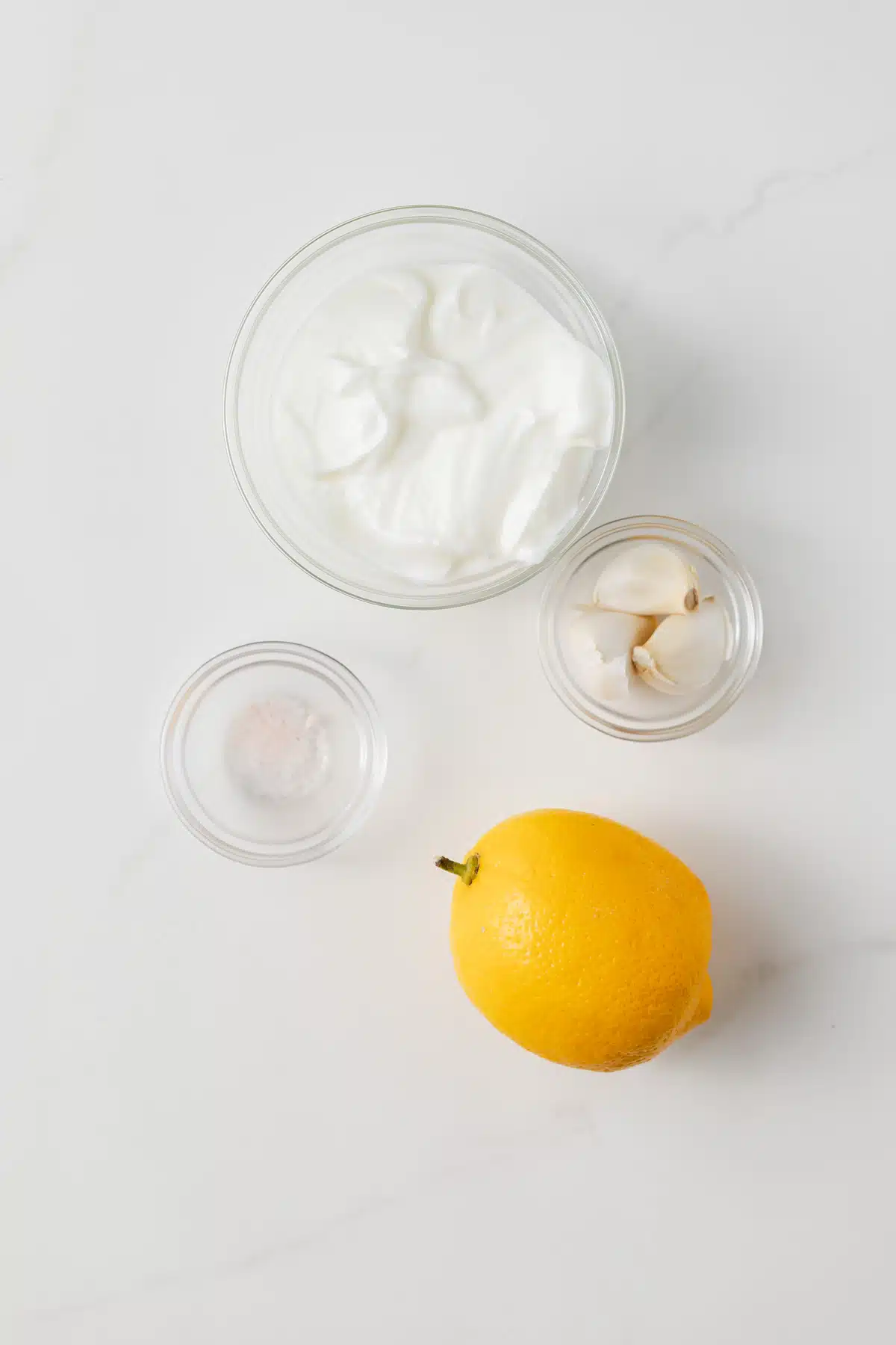 Ingredients for yogurt garlic sauce.