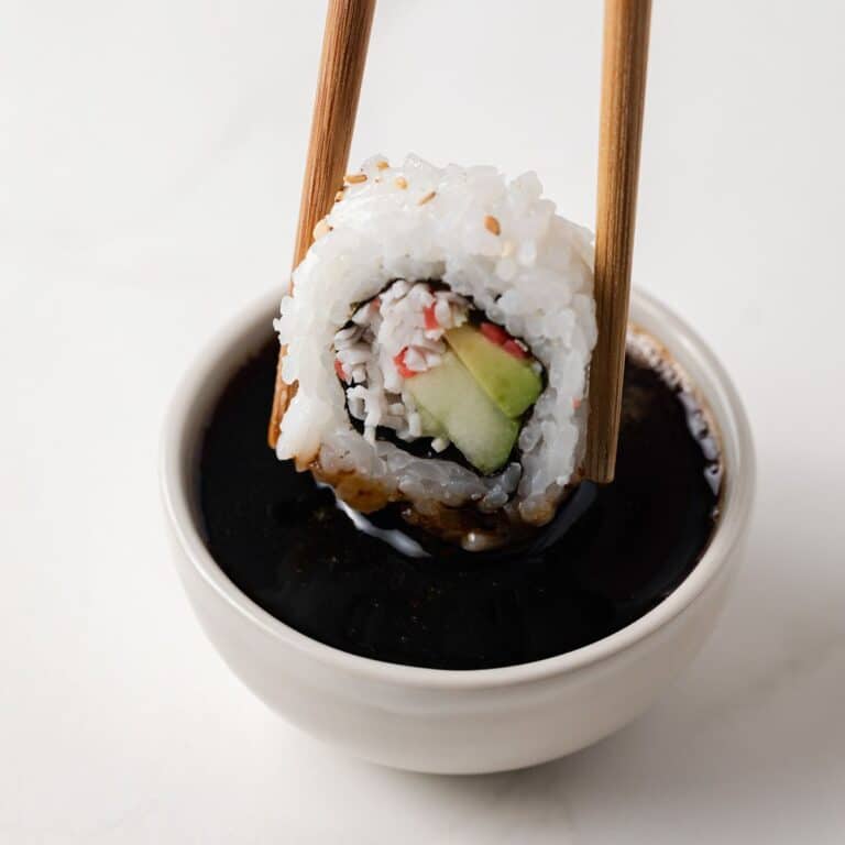 Sushi dipped in eel sauce.