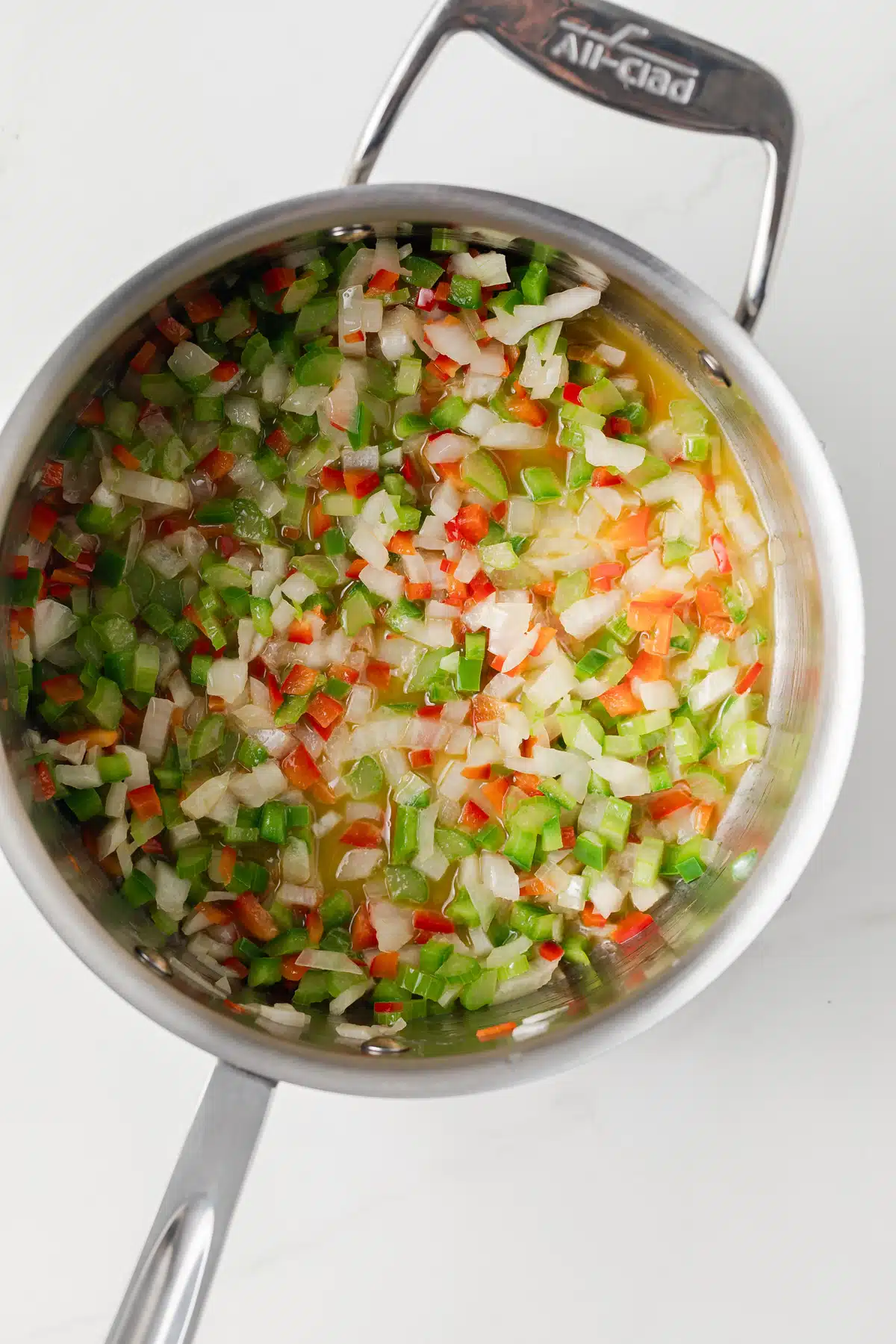 Sauteed veggies in saucepan.