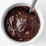 Overhead of hoisin sauce in white bowl.