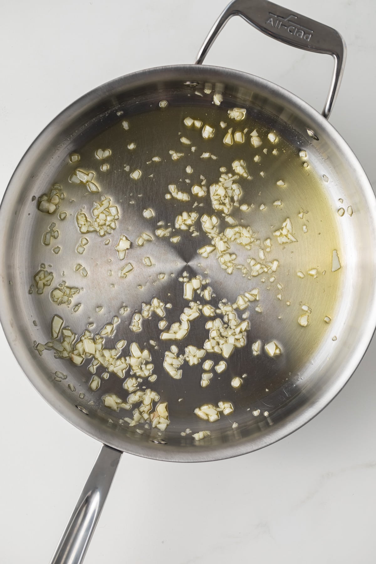 Sauteed garlic in a skillet.