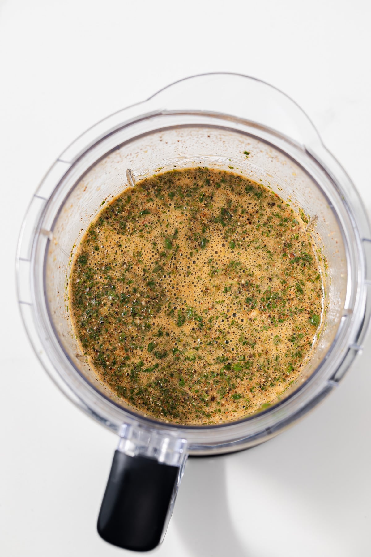 Carne asada marinade blended in a food processor.