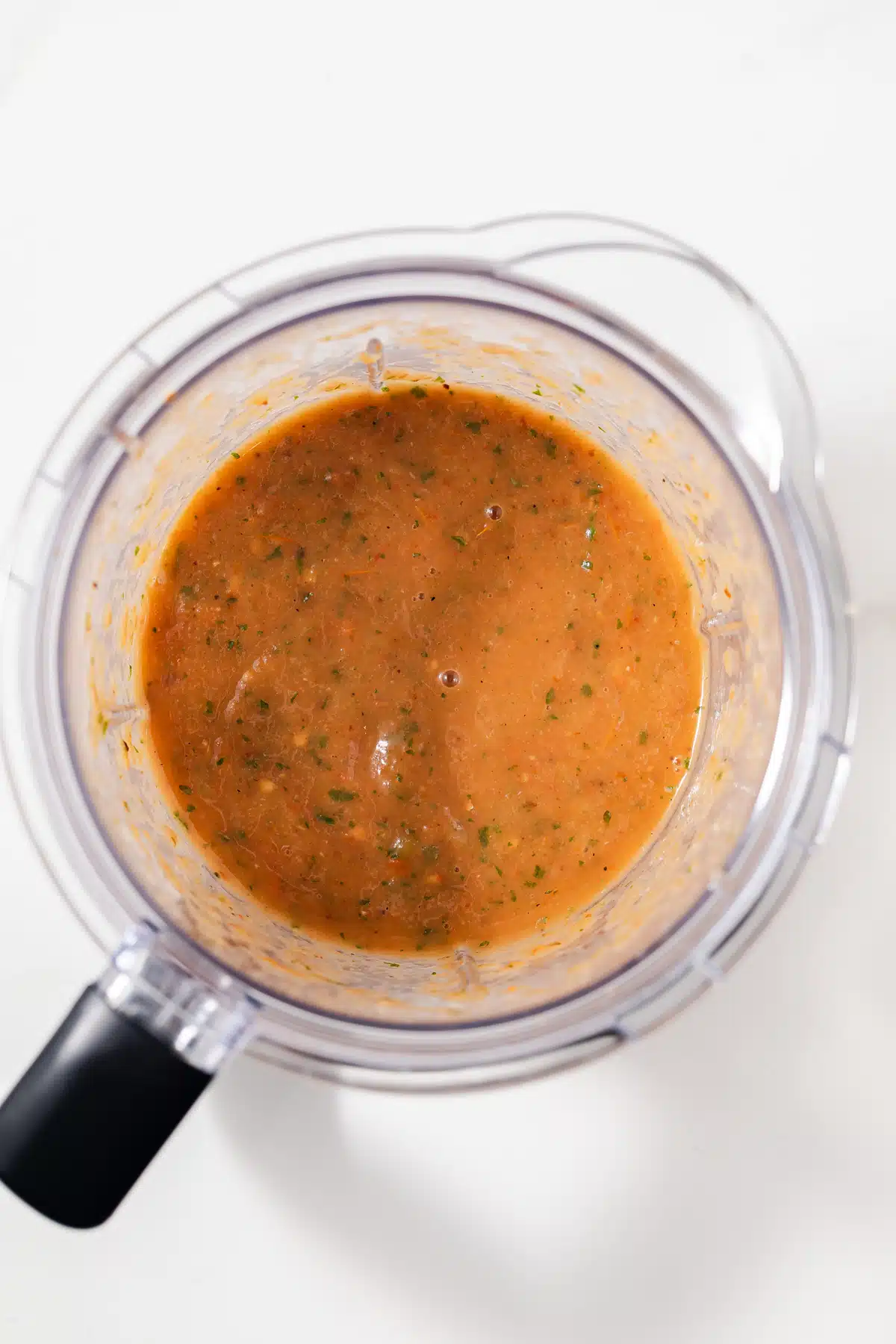 Empanada dipping sauce in blender bowl.