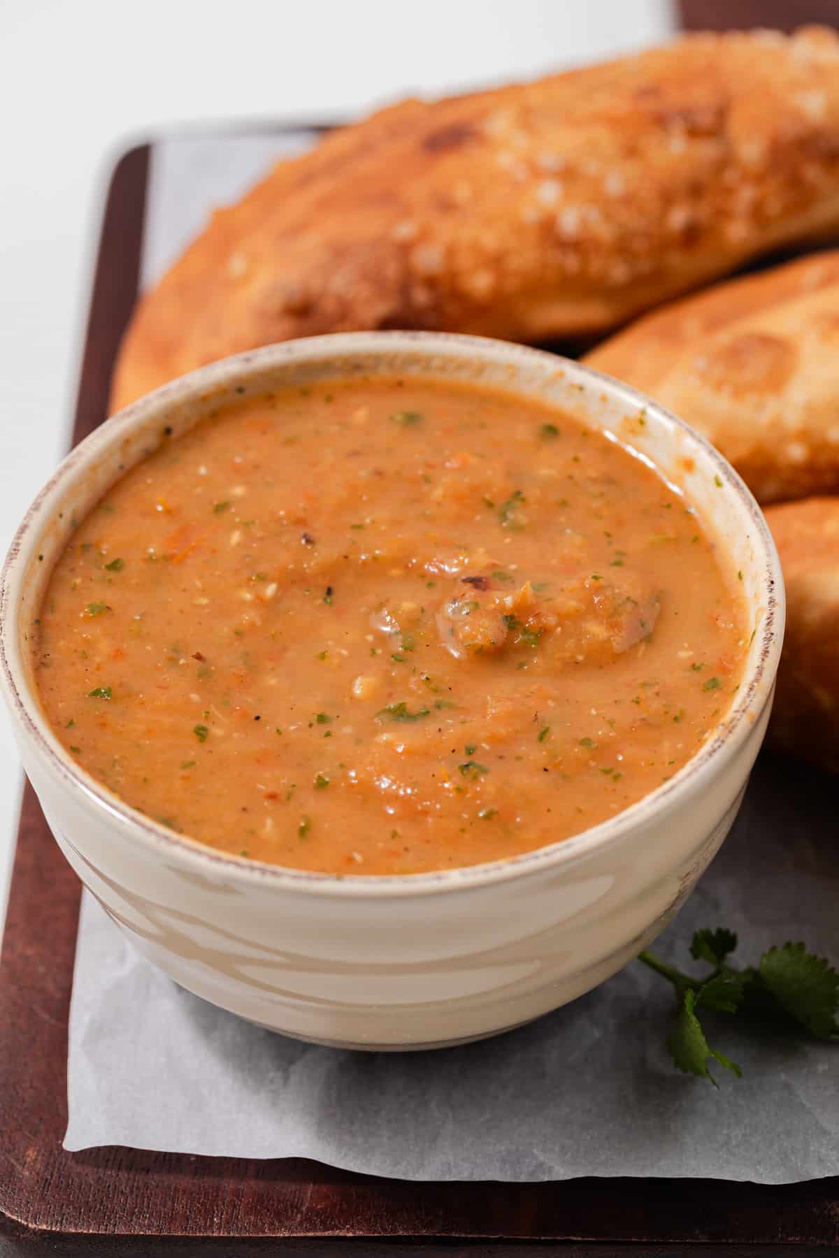 Close up bowl of empanada dipping sauce.