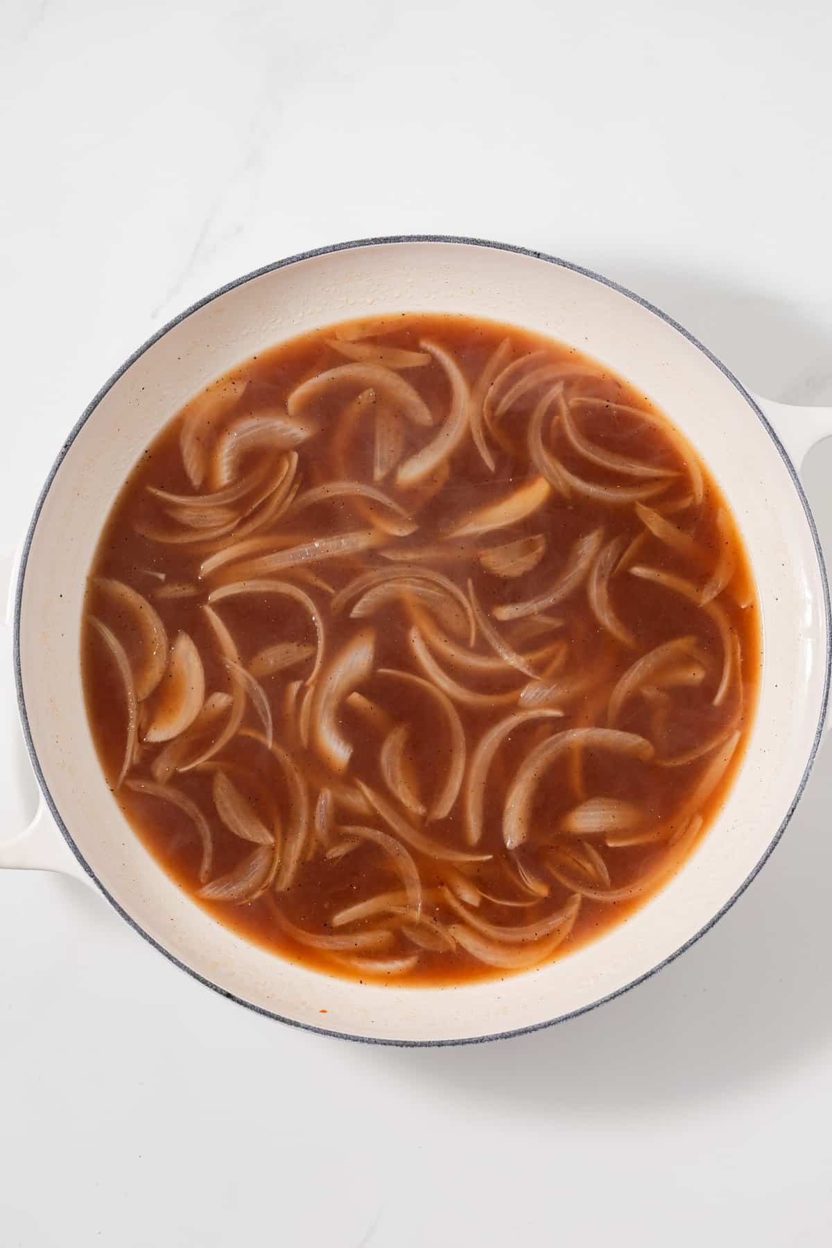 Salisbury steak sauce in pan.