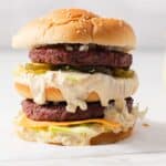 Homemade big mac on parchment paper.