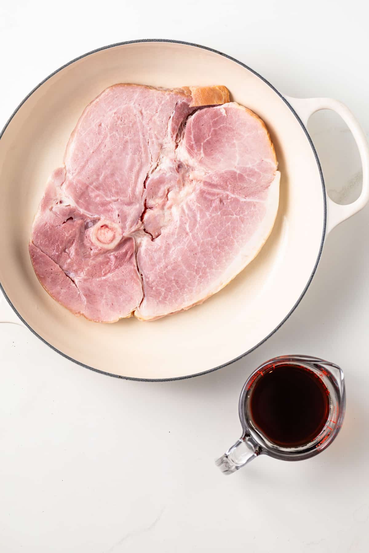 Ham steak and cup of coffee.