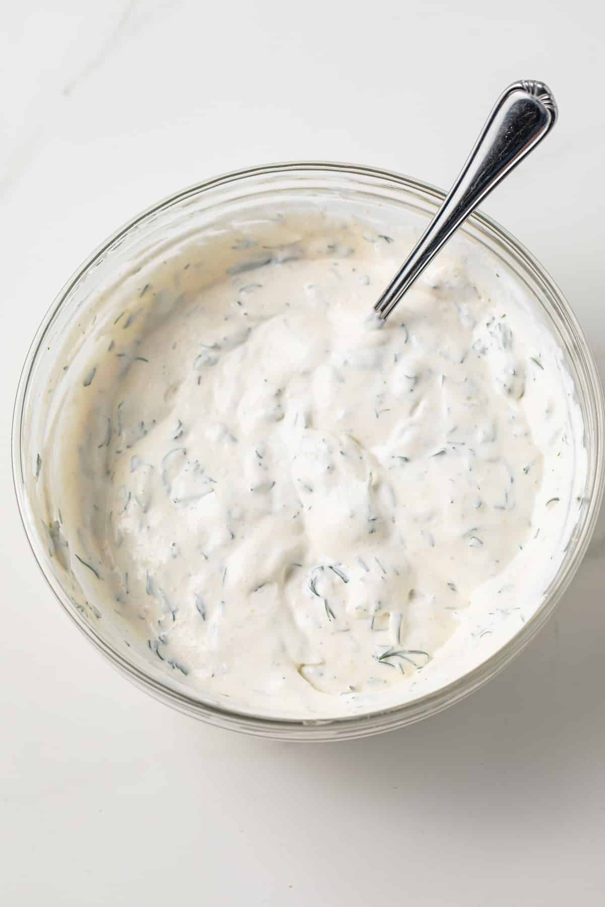 Veggie dip in glass bowl.