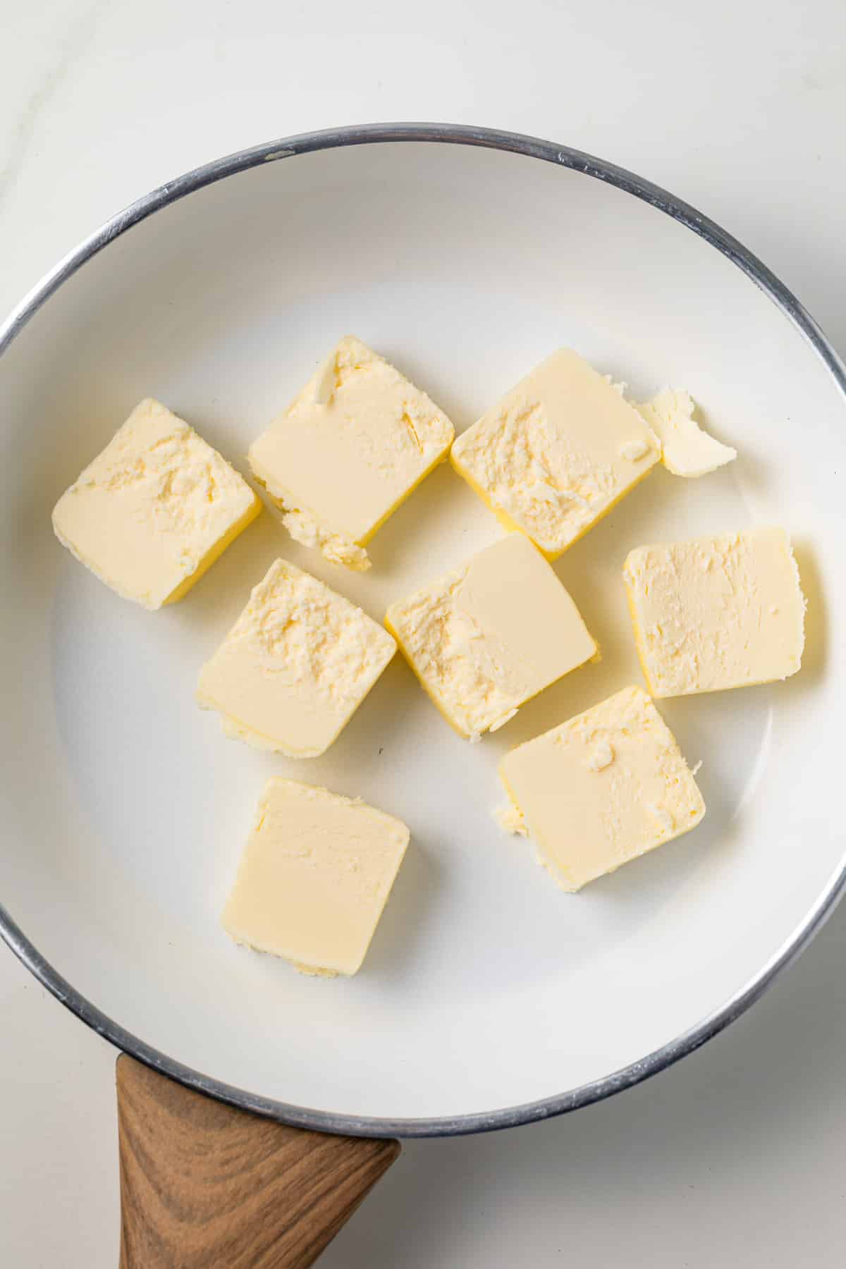 Cubes of butter in a pan.