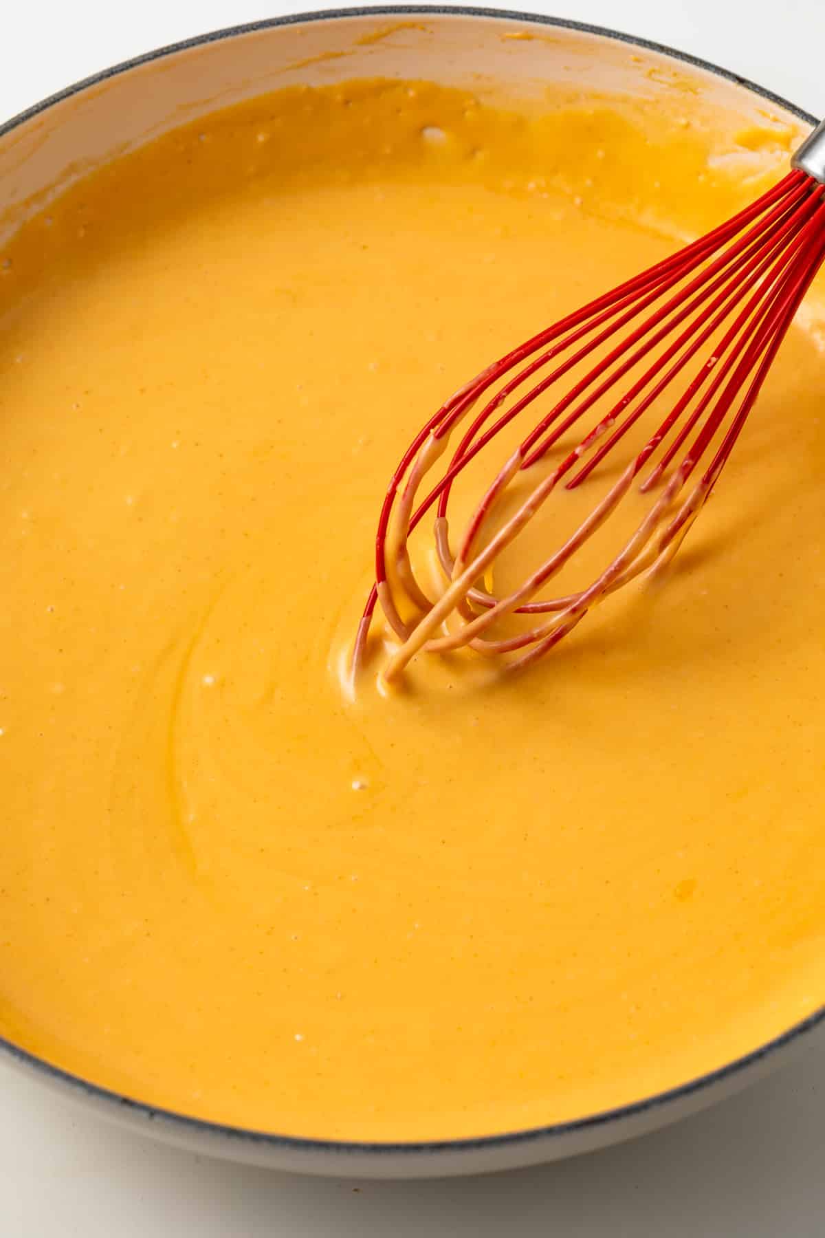 Pretzel cheese dip in a pan.