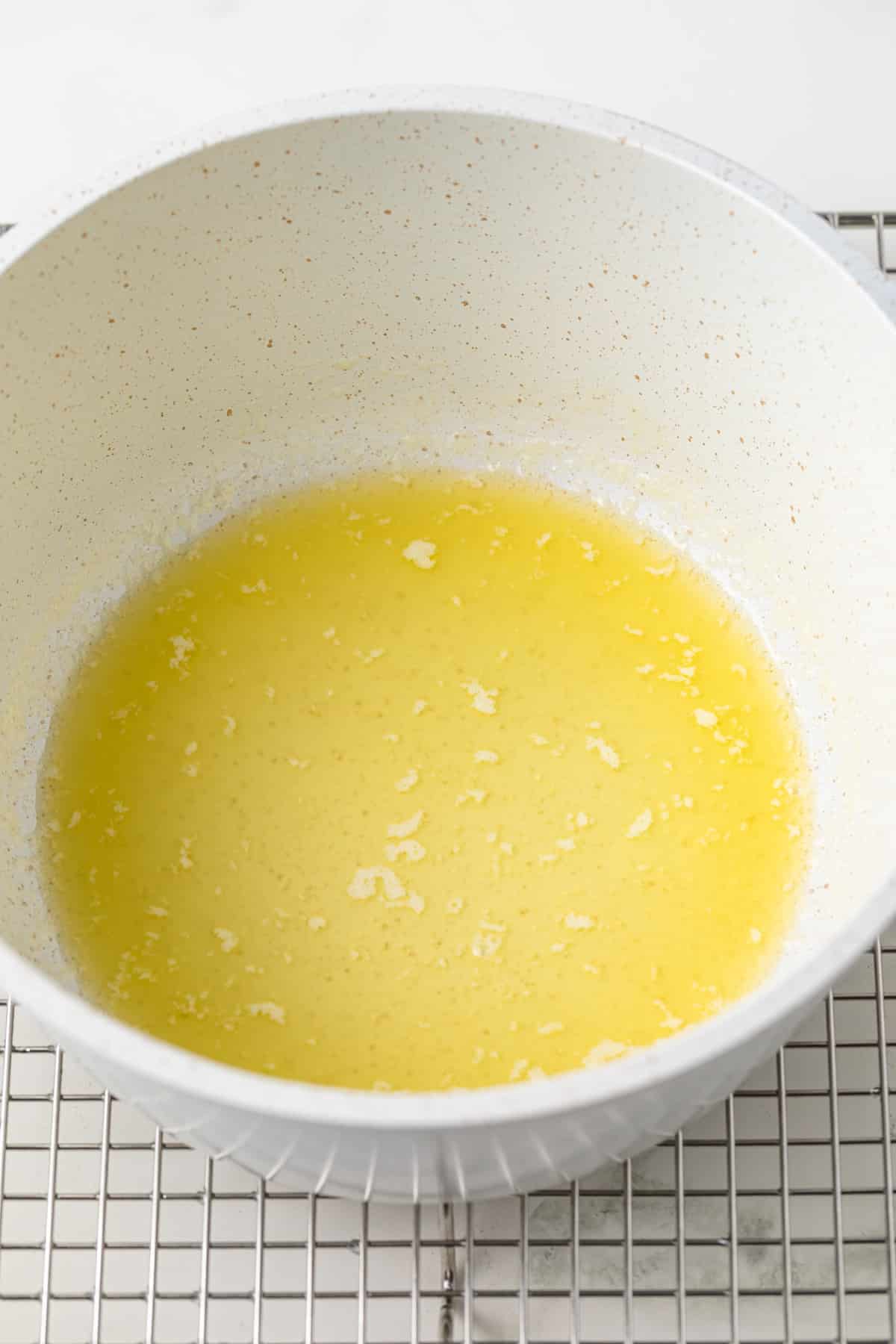 Melted butter in a saucepan.